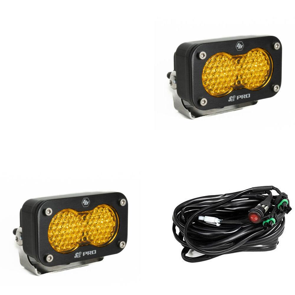 Baja Designs S2 Pro Series LED light pod pair shown from rear angle, displaying wiring harness and mount bracket