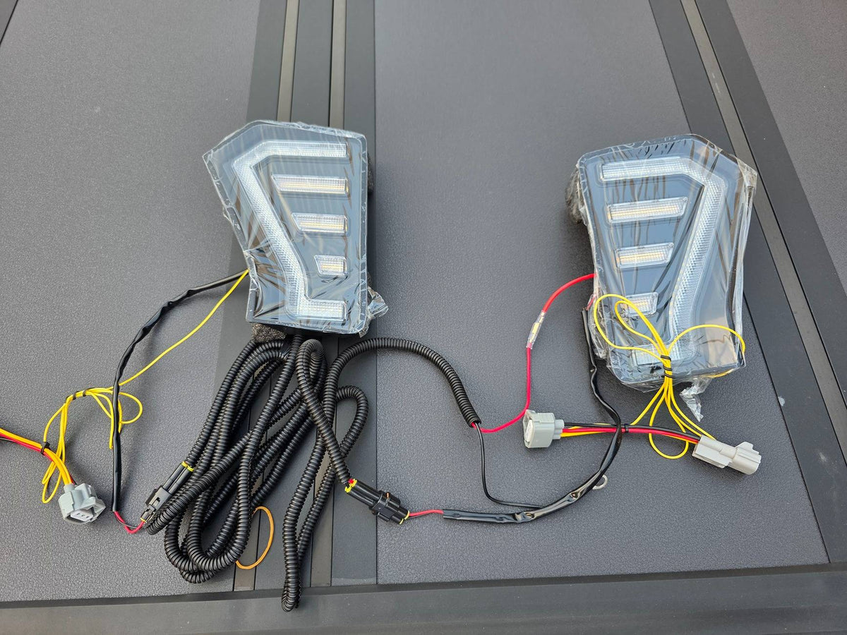 Aspire Auto Accessories V2 Fang Lights wiring harness and connector detail close-up