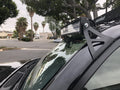 Cali Raised LED roof mount brackets for 52-inch curved LED light bar on 2003-2024 Toyota 4Runner, black powder-coated steel construction with hardware